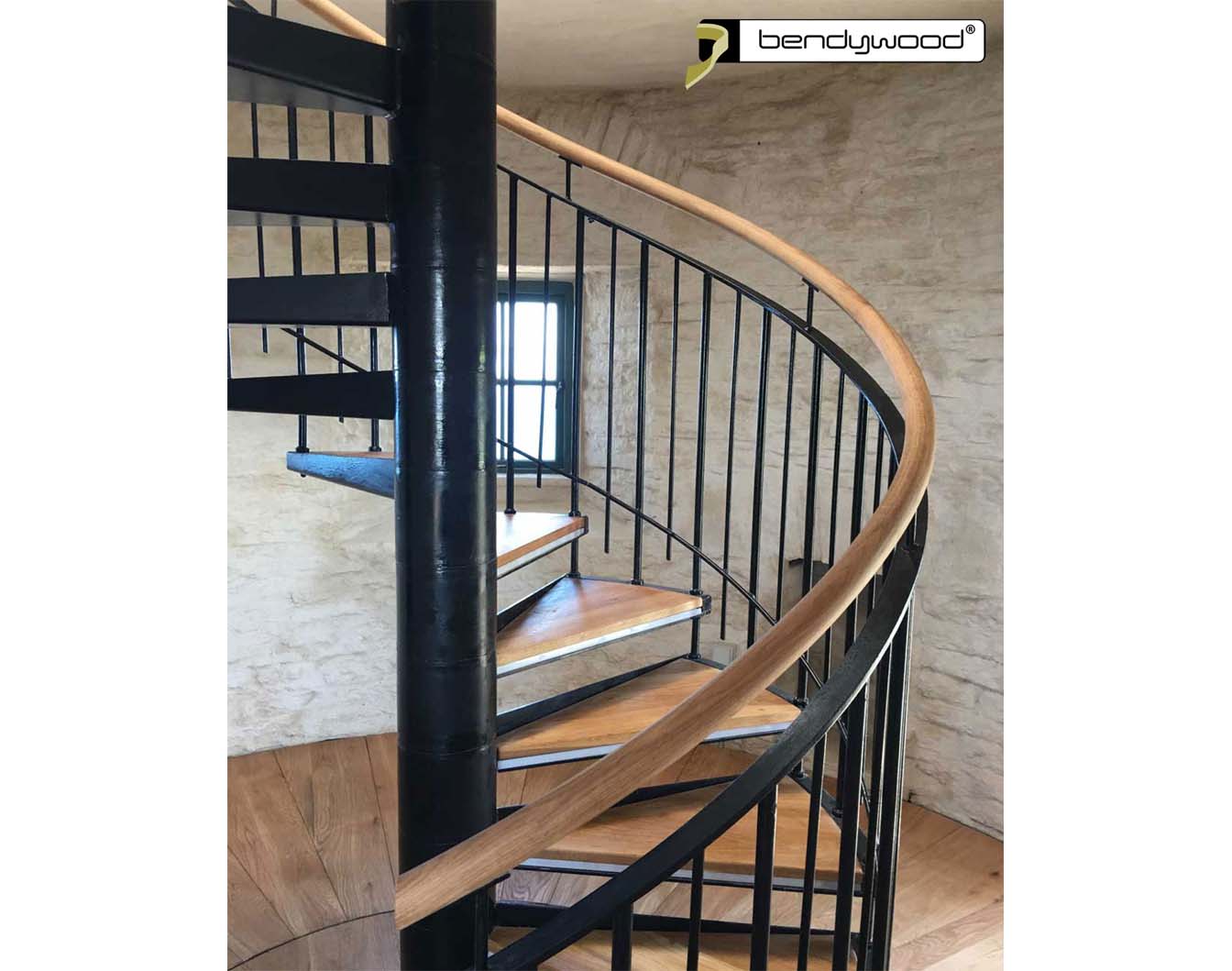 Bending wood Bendywood® - stairs with solid wooden handrail and glass railing 